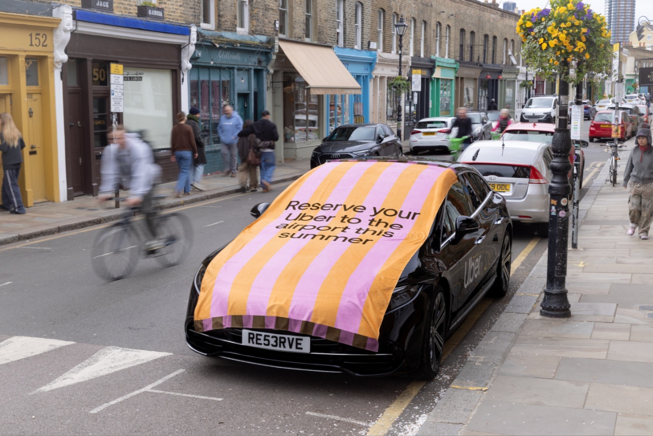 Uber car with a beach towel on it