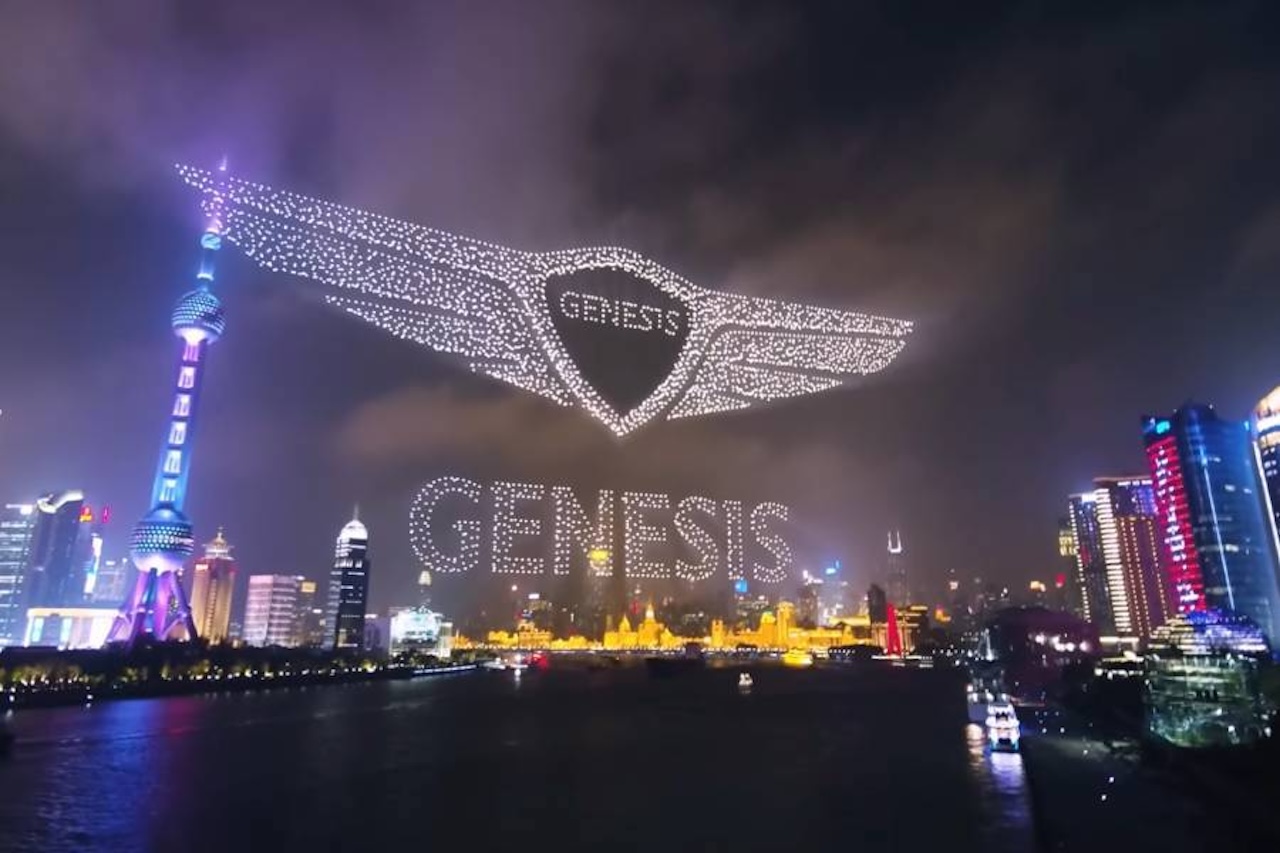 Genesis drone advertising show in night sky