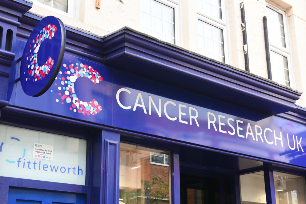An exterior shot of a Cancer Research UK charity shop