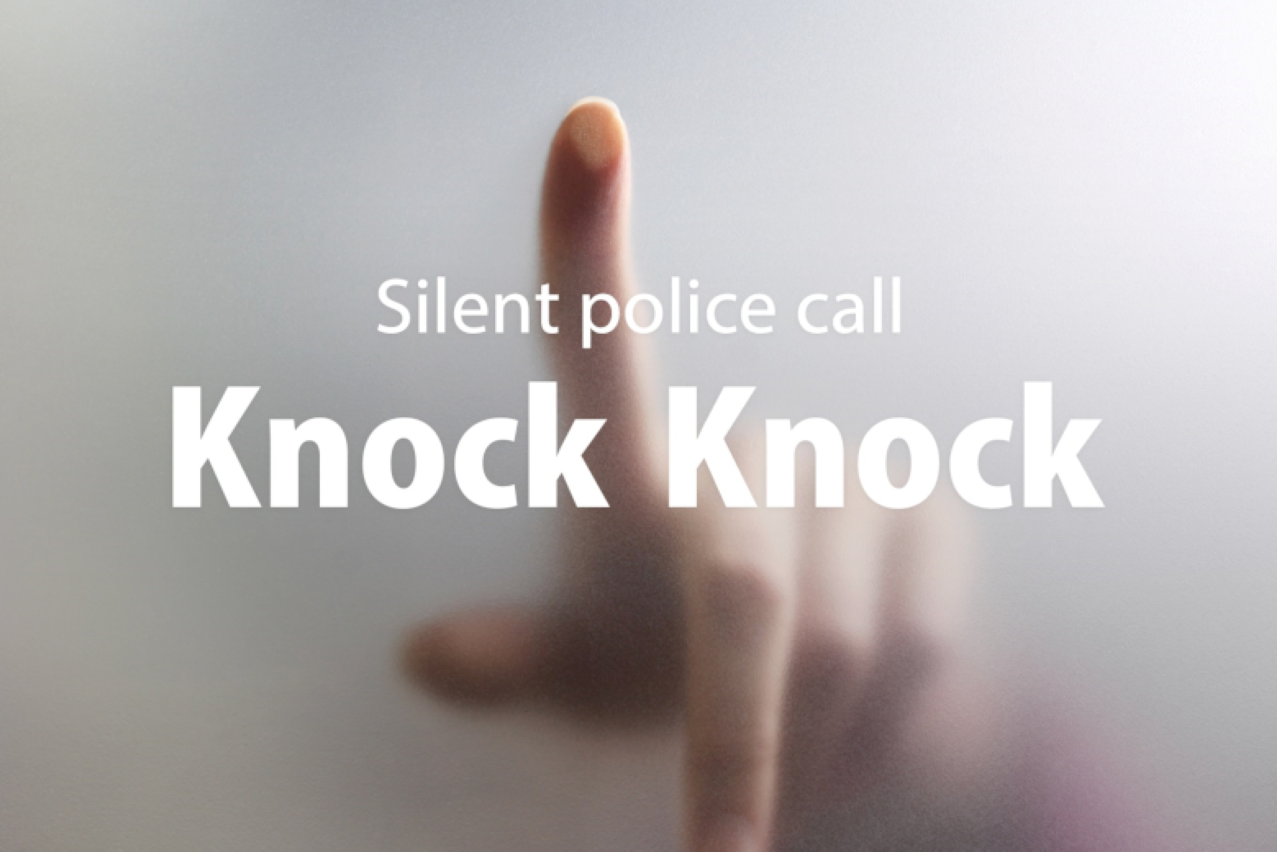 A still image from the campaign showing a finger pressing on the glass of a mobile phone screen