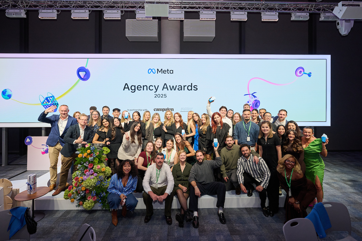large group of award winners on stage