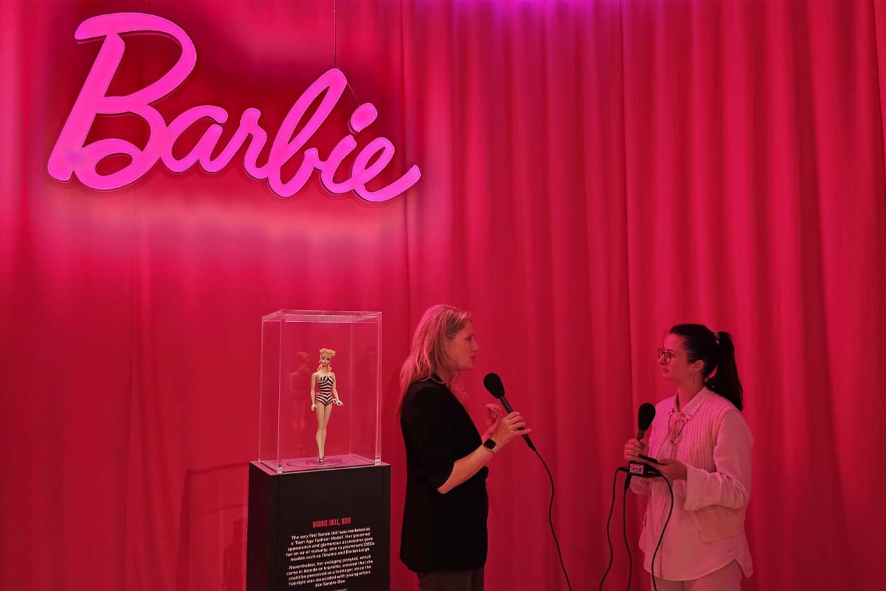Krista Berger and Lucy Shelley recording at Barbie: The Exhibition