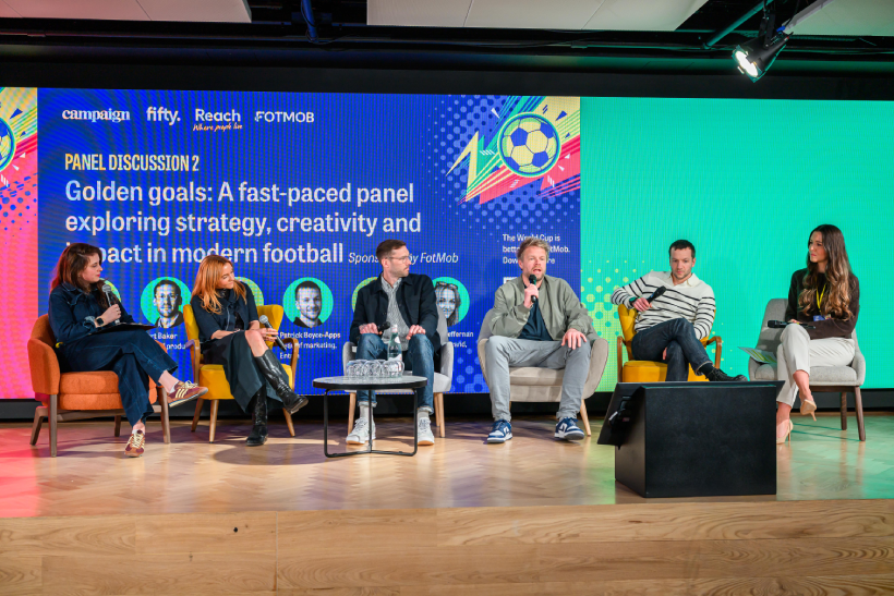 panel of 6 people being interview on stage