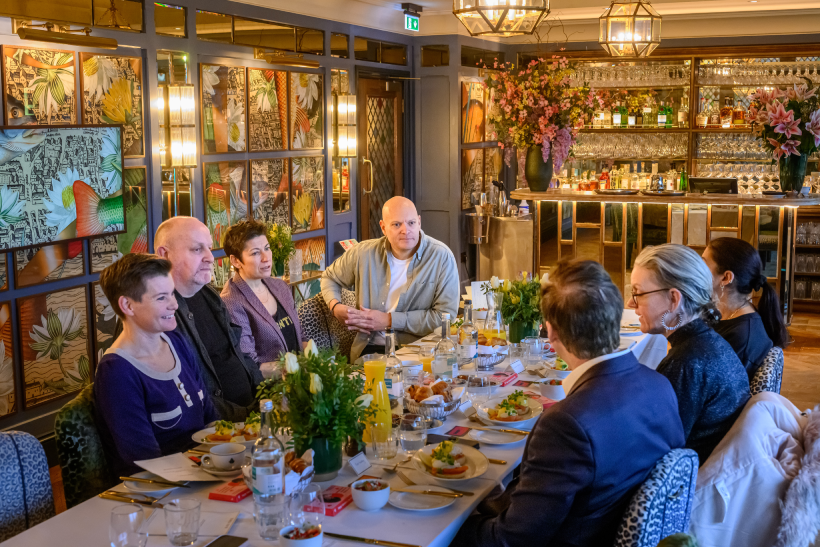 people round a table